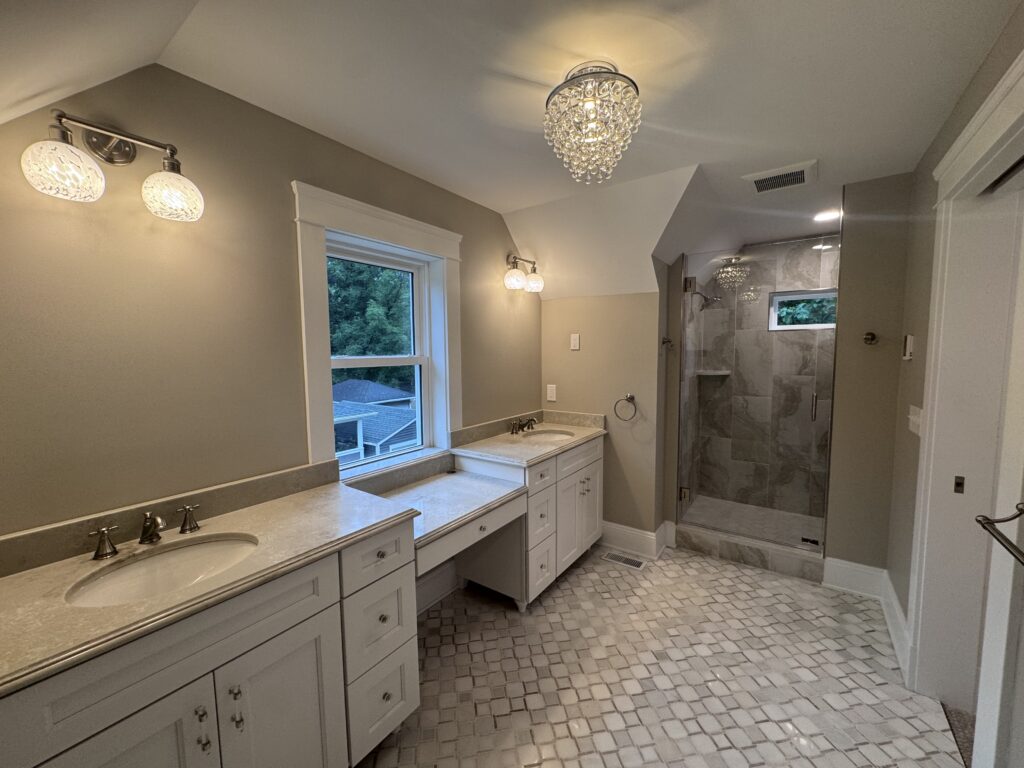 Chagrin Falls, Ohio This completed residential addition transformed the home with a beautifully designed first floor featuring a wet bar, laundry room, pantry, and bathroom, along with a second-floor expansion that includes a spacious walk-in closet and spa-like bathroom, delivered through full preconstruction and construction management services.